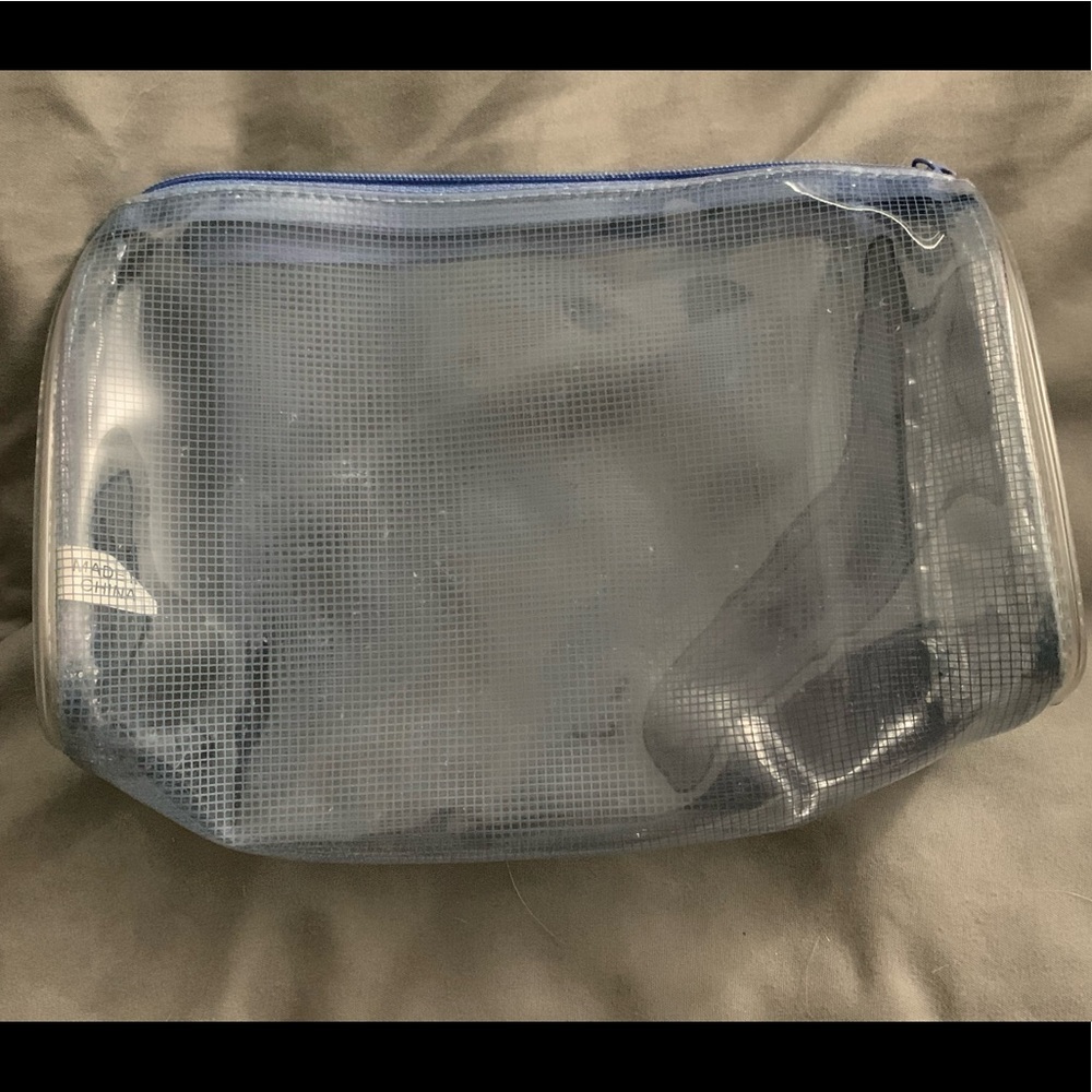 Blue transparent cosmetic bag.